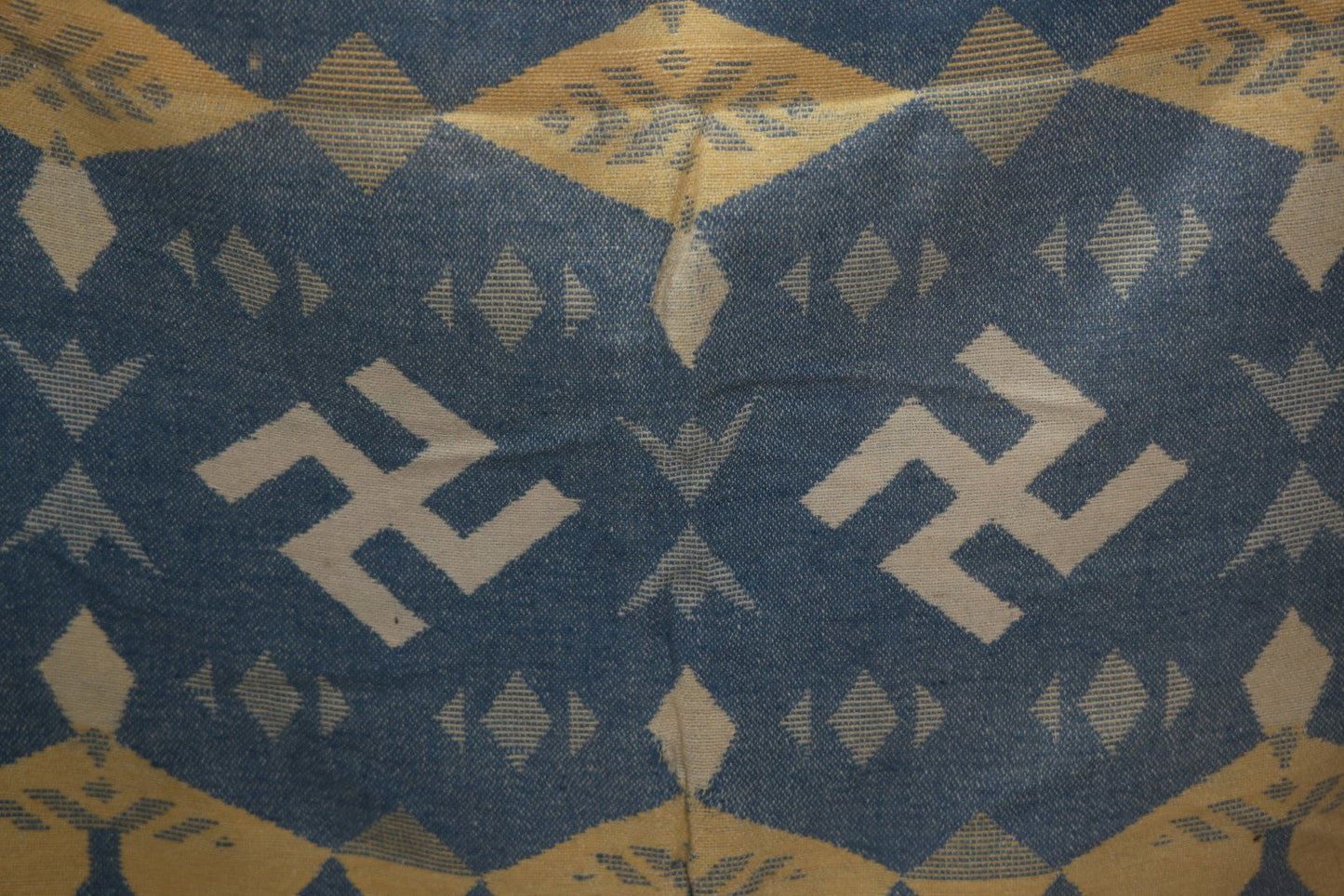 Lot 011 - Vintage Navajo-Style Textile Camp Blanket With Whirling Logs And Thunderbird Motifs, Blue And Yellow, Circa 1920s 60" x 70"