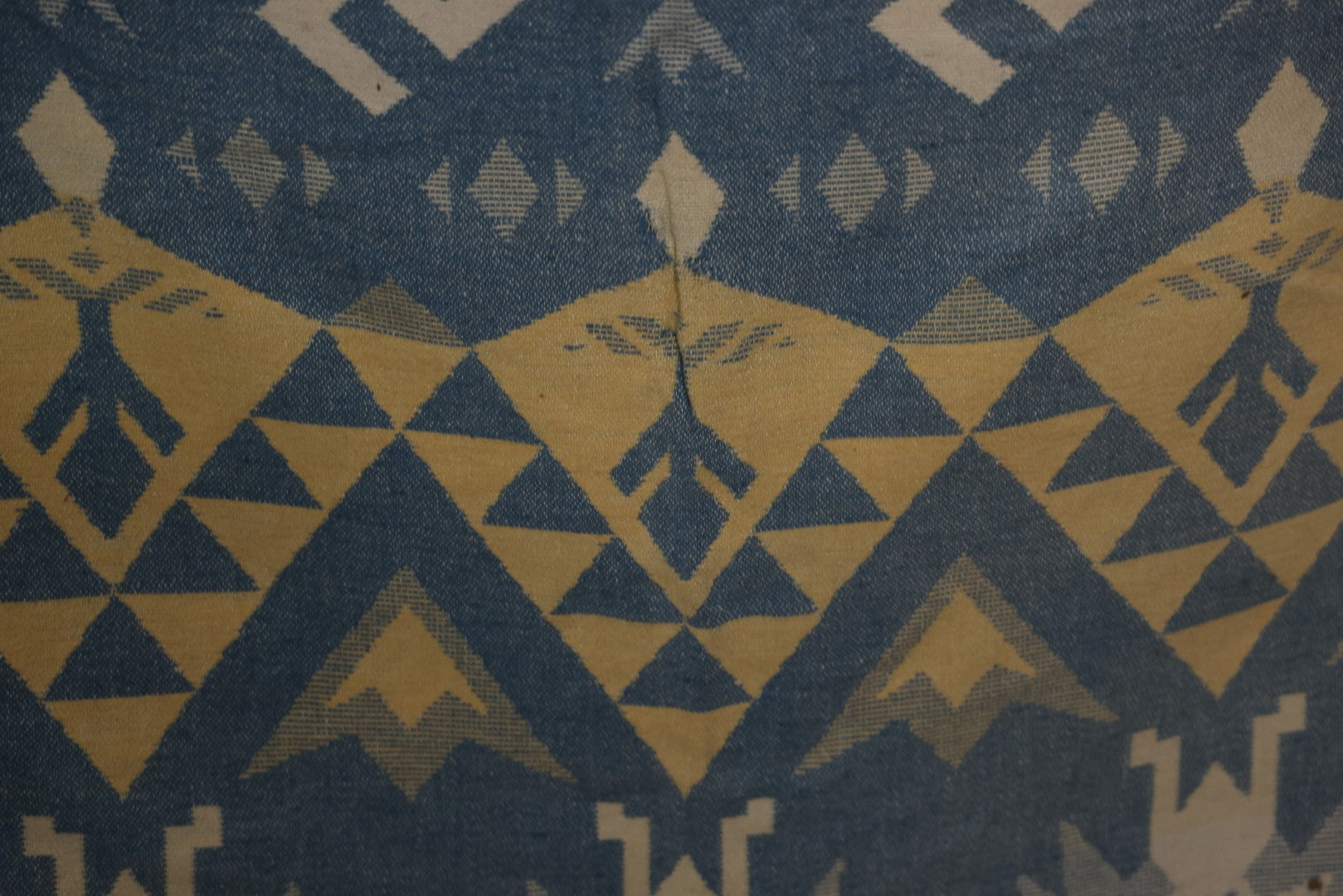 Lot 011 - Vintage Navajo-Style Textile Camp Blanket With Whirling Logs And Thunderbird Motifs, Blue And Yellow, Circa 1920s 60" x 70"
