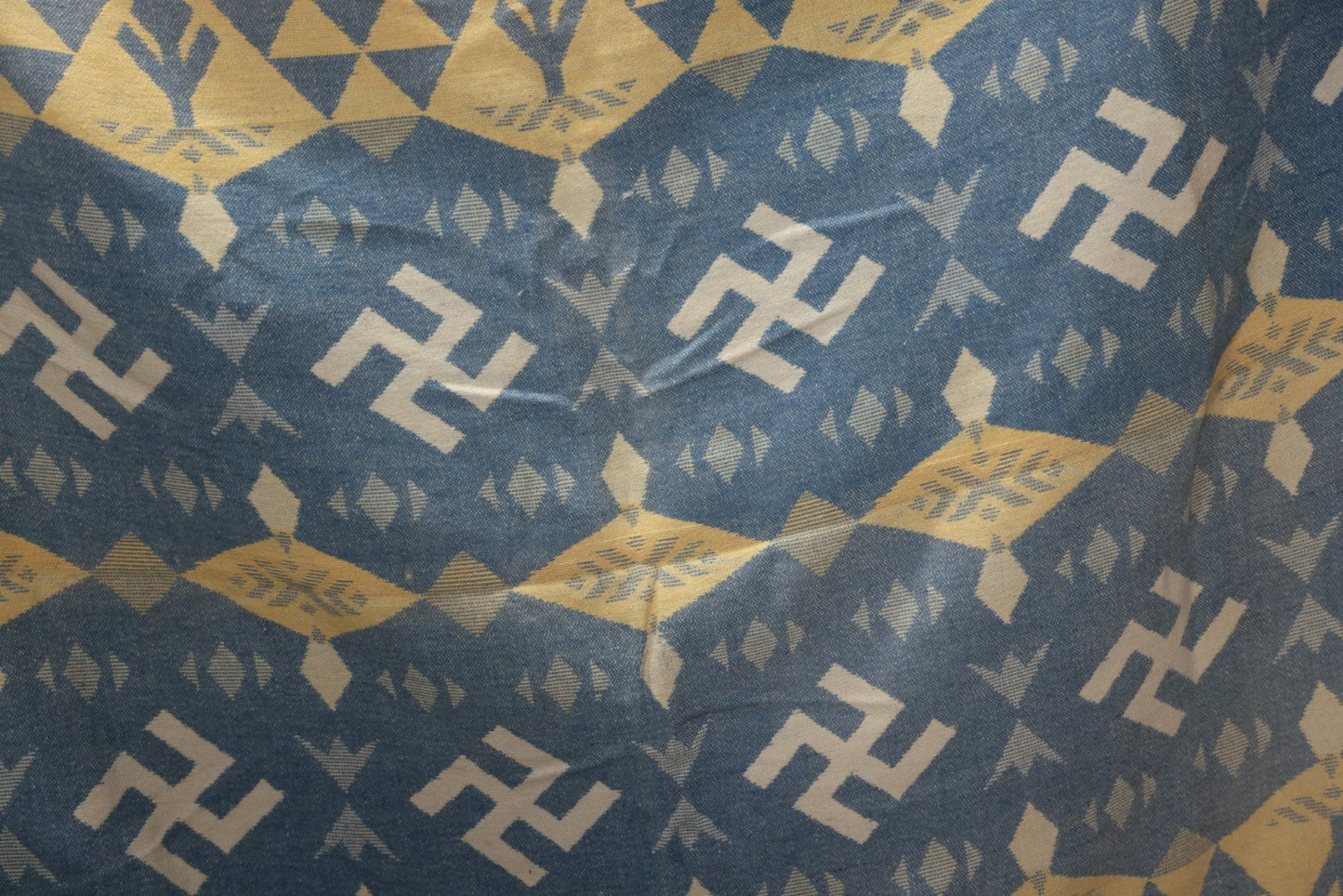 Lot 011 - Vintage Navajo-Style Textile Camp Blanket With Whirling Logs And Thunderbird Motifs, Blue And Yellow, Circa 1920s 60" x 70"