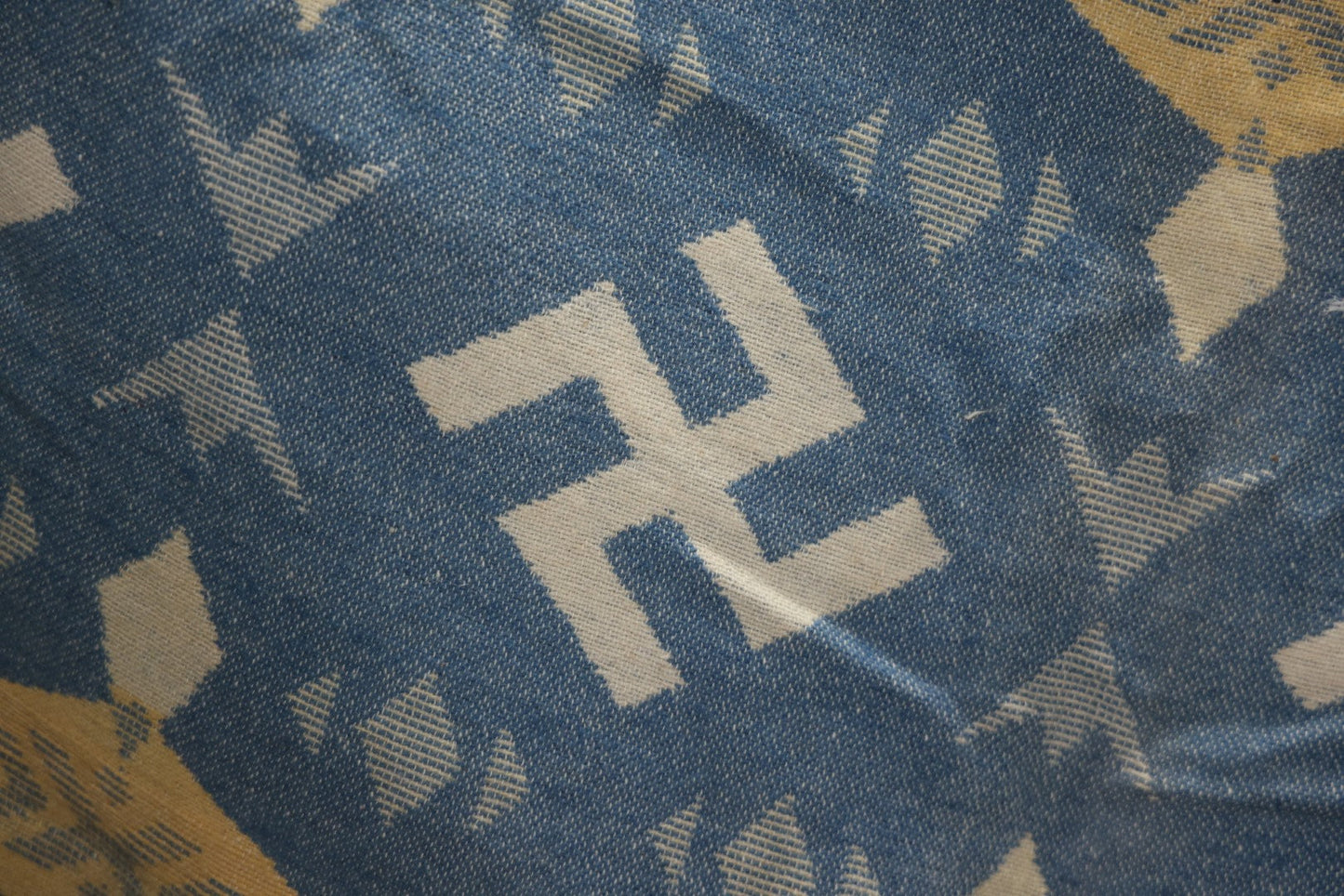 Lot 011 - Vintage Navajo-Style Textile Camp Blanket With Whirling Logs And Thunderbird Motifs, Blue And Yellow, Circa 1920s 60" x 70"