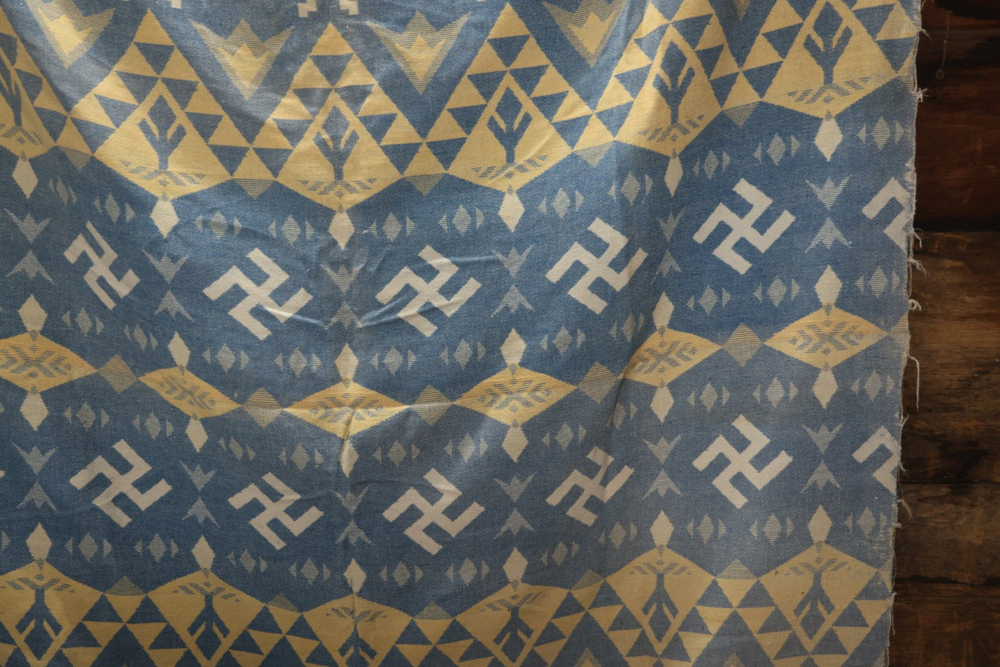 Lot 011 - Vintage Navajo-Style Textile Camp Blanket With Whirling Logs And Thunderbird Motifs, Blue And Yellow, Circa 1920s 60" x 70"