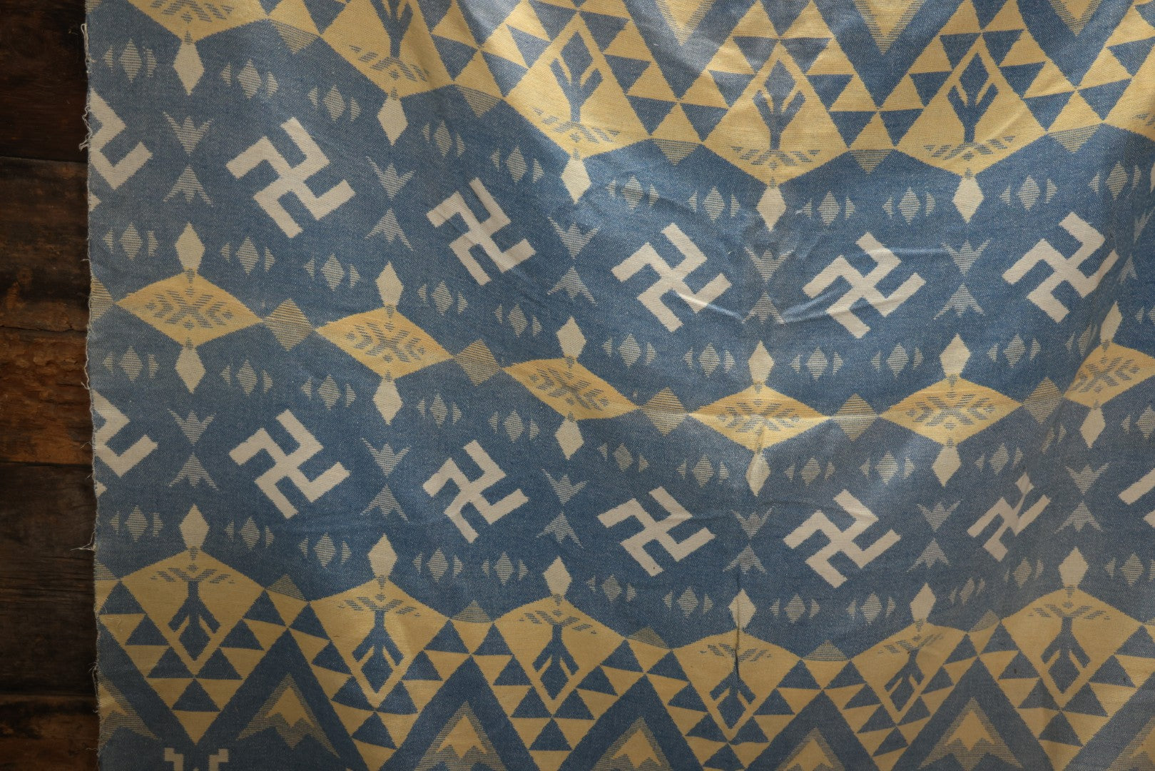 Lot 011 - Vintage Navajo-Style Textile Camp Blanket With Whirling Logs And Thunderbird Motifs, Blue And Yellow, Circa 1920s 60" x 70"