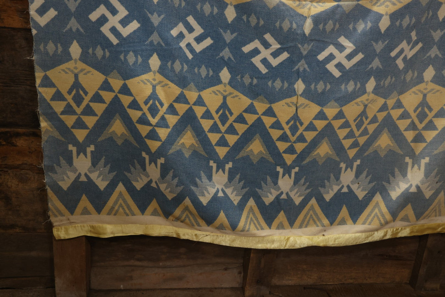 Lot 011 - Vintage Navajo-Style Textile Camp Blanket With Whirling Logs And Thunderbird Motifs, Blue And Yellow, Circa 1920s 60" x 70"