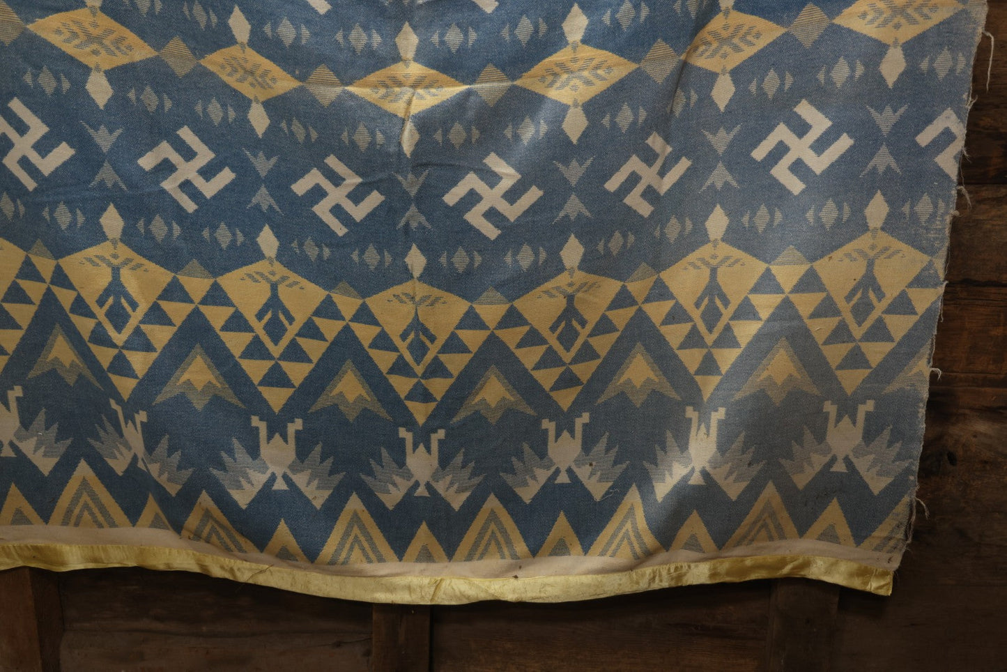 Lot 011 - Vintage Navajo-Style Textile Camp Blanket With Whirling Logs And Thunderbird Motifs, Blue And Yellow, Circa 1920s 60" x 70"