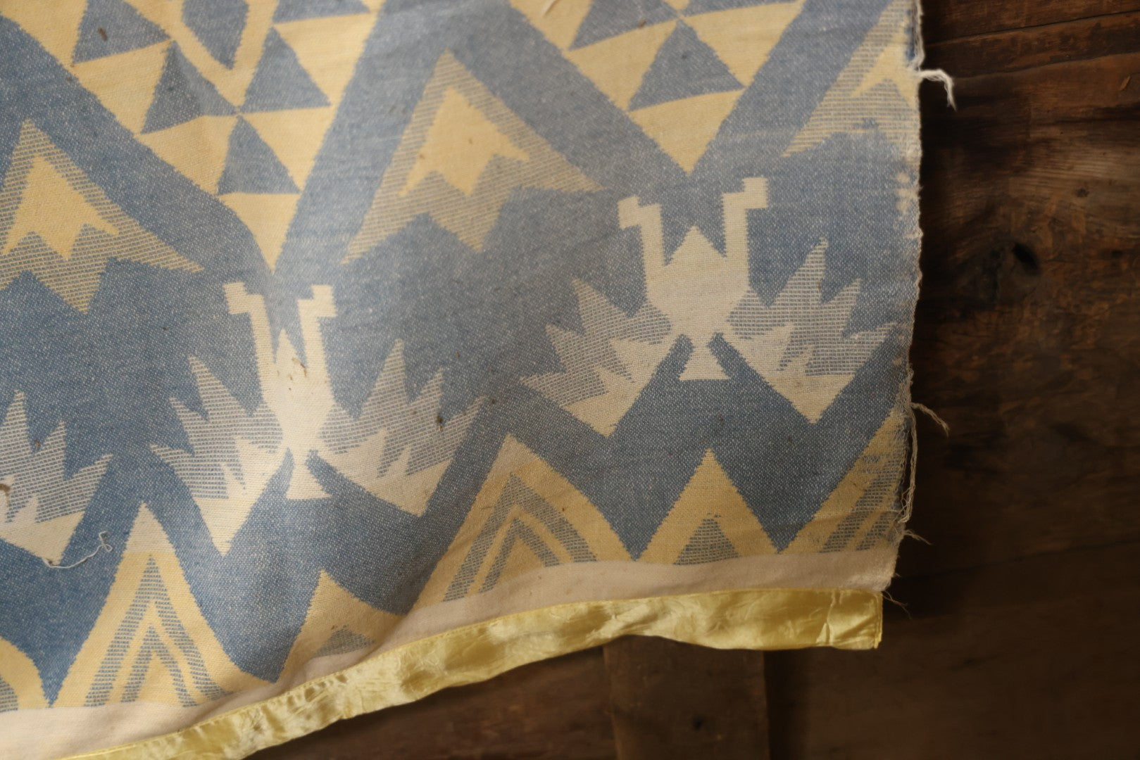 Lot 011 - Vintage Navajo-Style Textile Camp Blanket With Whirling Logs And Thunderbird Motifs, Blue And Yellow, Circa 1920s 60" x 70"