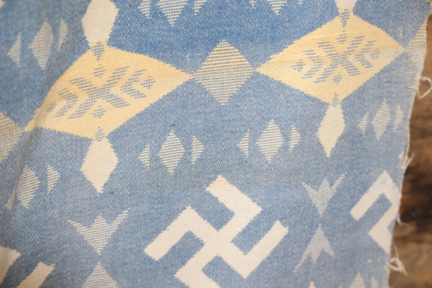 Lot 011 - Vintage Navajo-Style Textile Camp Blanket With Whirling Logs And Thunderbird Motifs, Blue And Yellow, Circa 1920s 60" x 70"