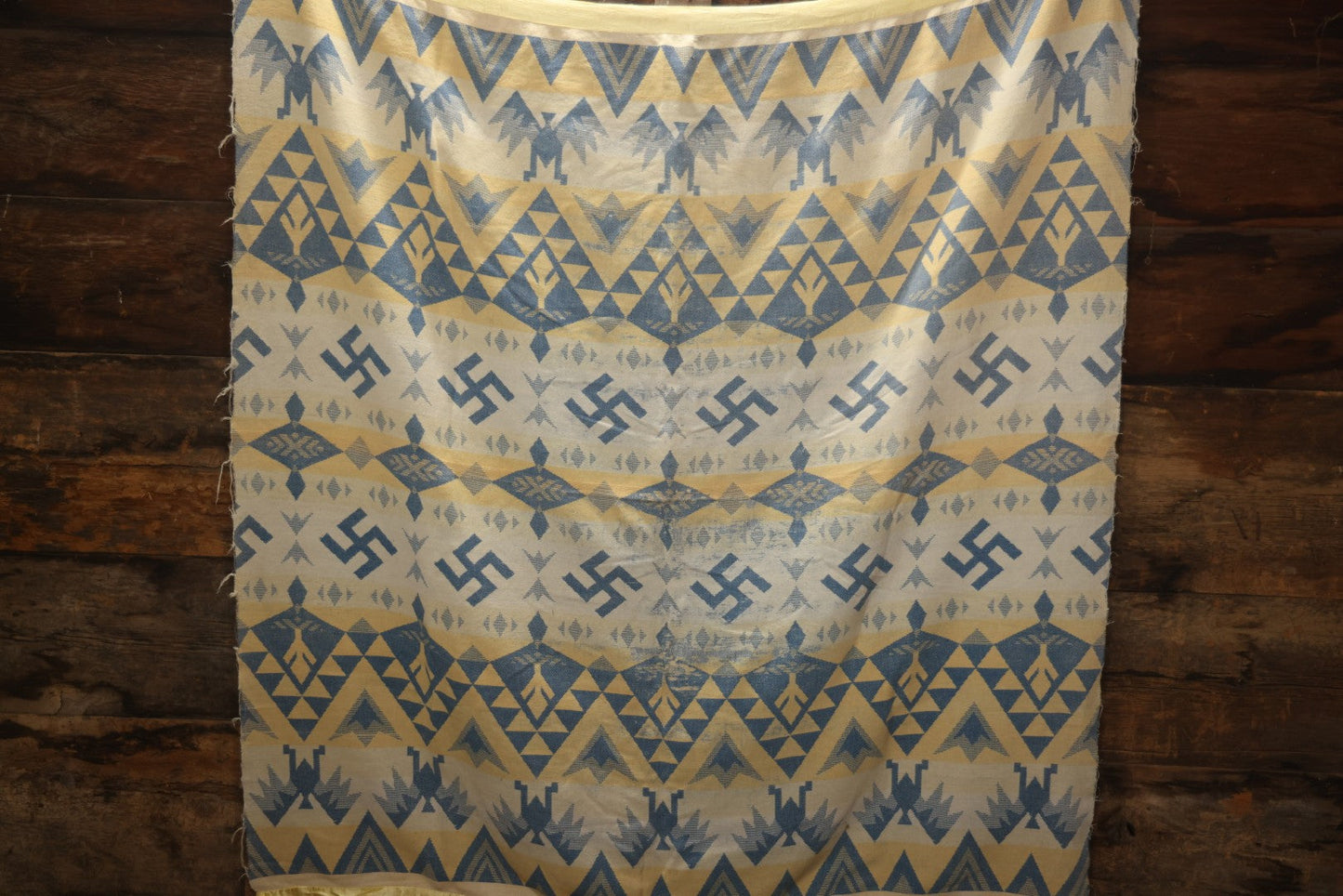 Lot 011 - Vintage Navajo-Style Textile Camp Blanket With Whirling Logs And Thunderbird Motifs, Blue And Yellow, Circa 1920s 60" x 70"