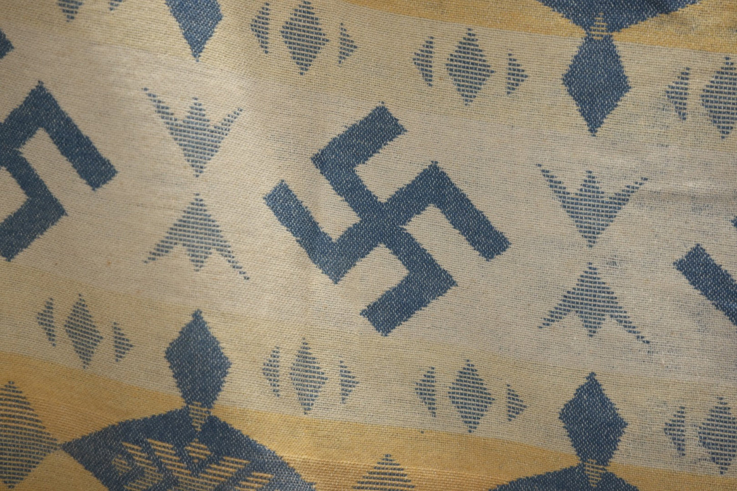 Lot 011 - Vintage Navajo-Style Textile Camp Blanket With Whirling Logs And Thunderbird Motifs, Blue And Yellow, Circa 1920s 60" x 70"