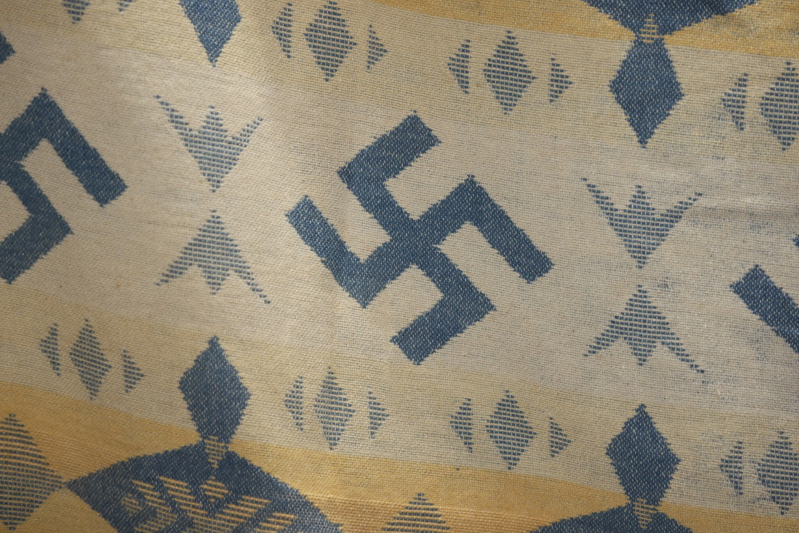 Lot 011 - Vintage Navajo-Style Textile Camp Blanket With Whirling Logs And Thunderbird Motifs, Blue And Yellow, Circa 1920s 60" x 70"