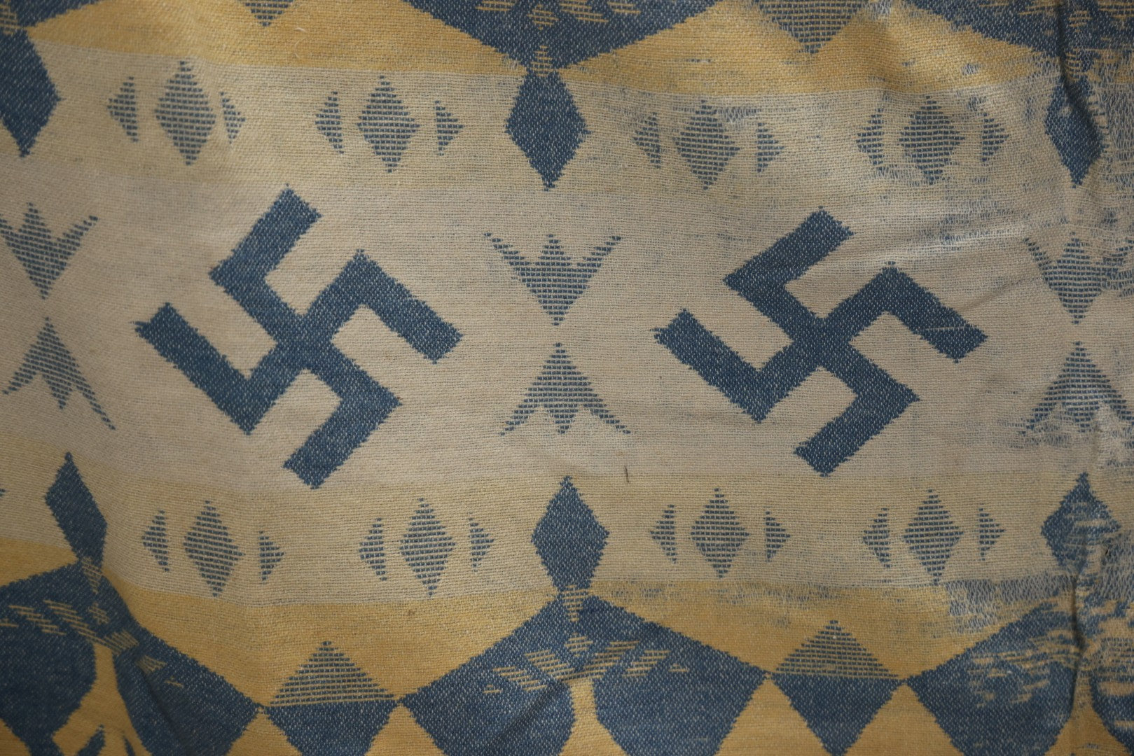 Lot 011 - Vintage Navajo-Style Textile Camp Blanket With Whirling Logs And Thunderbird Motifs, Blue And Yellow, Circa 1920s 60" x 70"