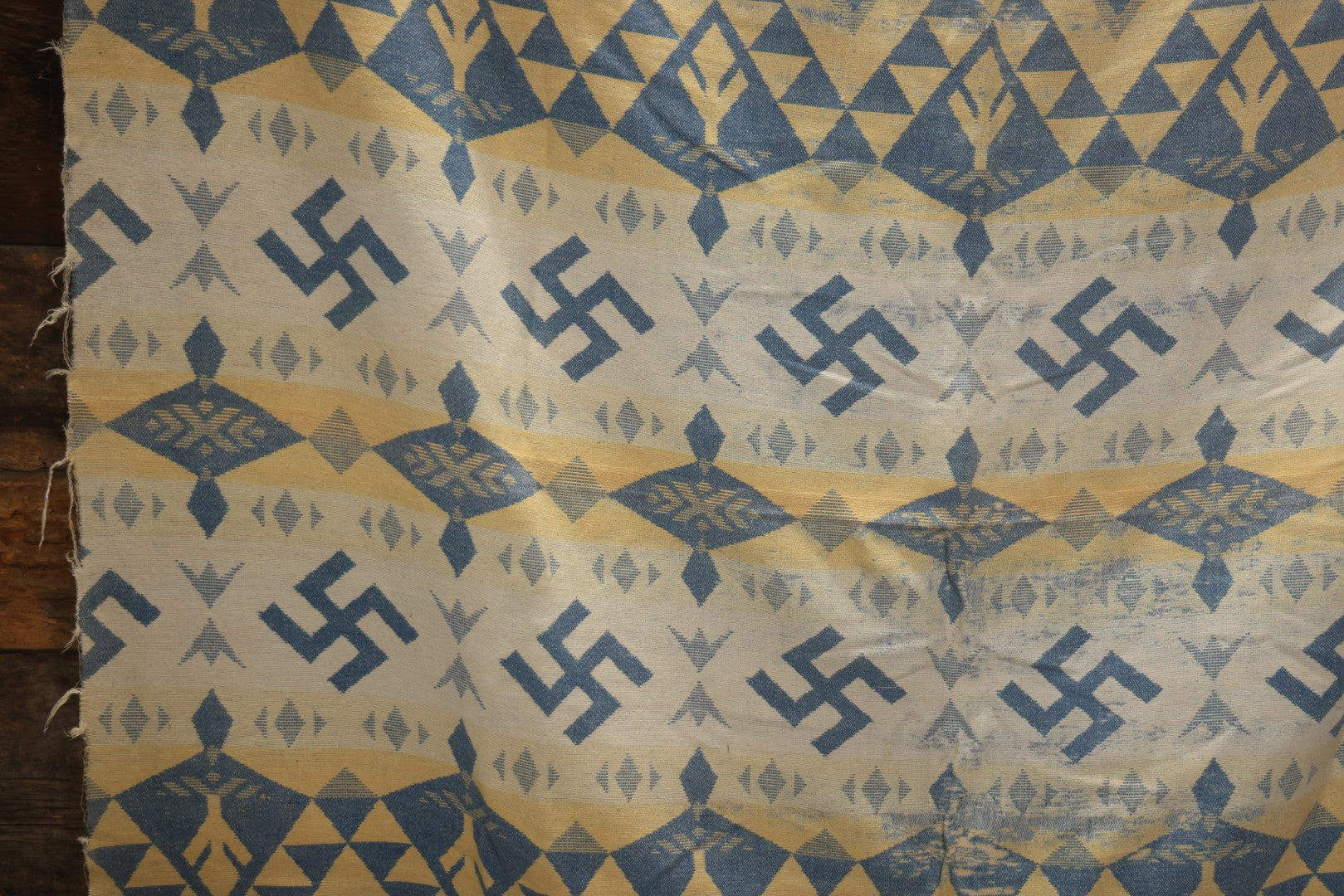 Lot 011 - Vintage Navajo-Style Textile Camp Blanket With Whirling Logs And Thunderbird Motifs, Blue And Yellow, Circa 1920s 60" x 70"