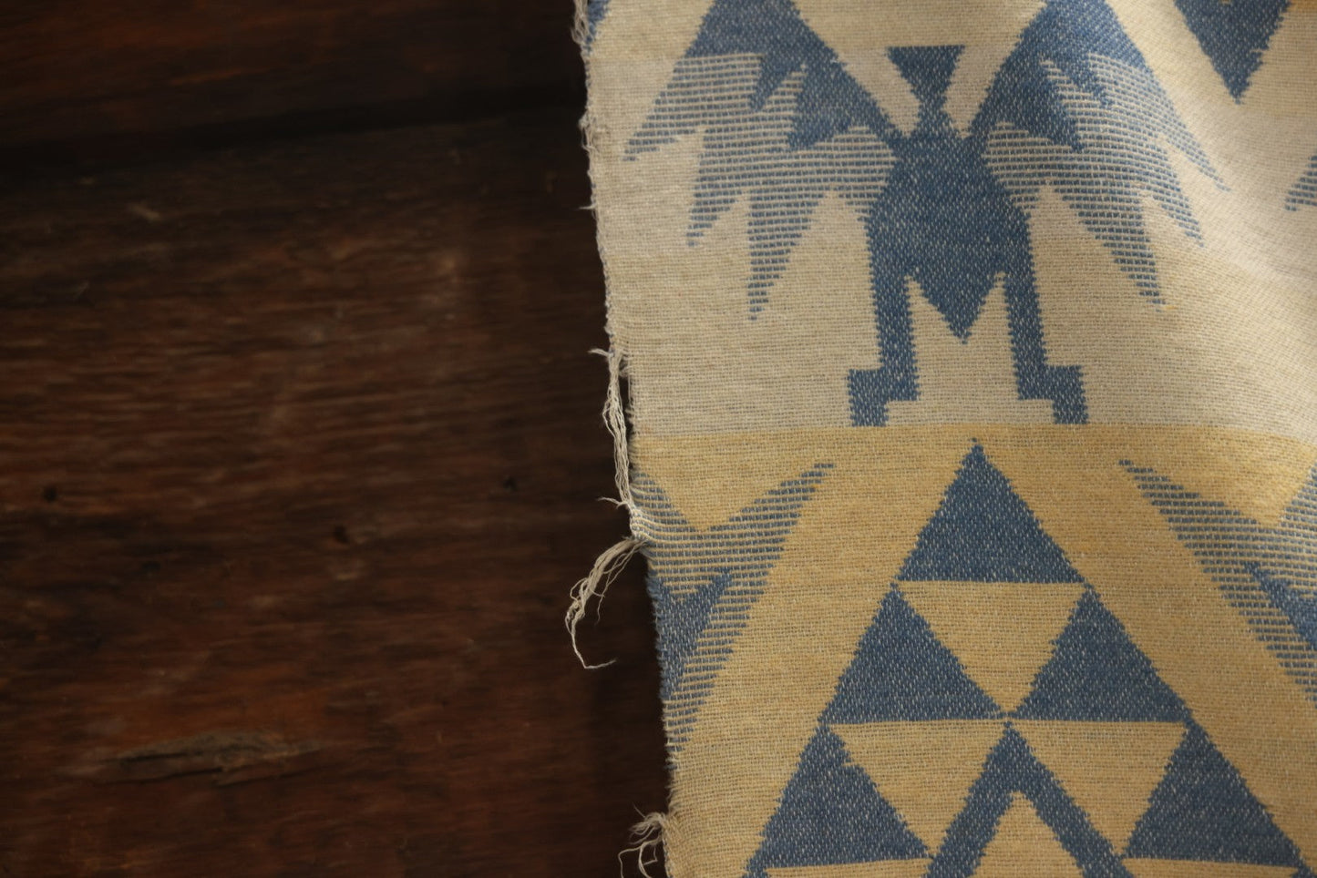 Lot 011 - Vintage Navajo-Style Textile Camp Blanket With Whirling Logs And Thunderbird Motifs, Blue And Yellow, Circa 1920s 60" x 70"