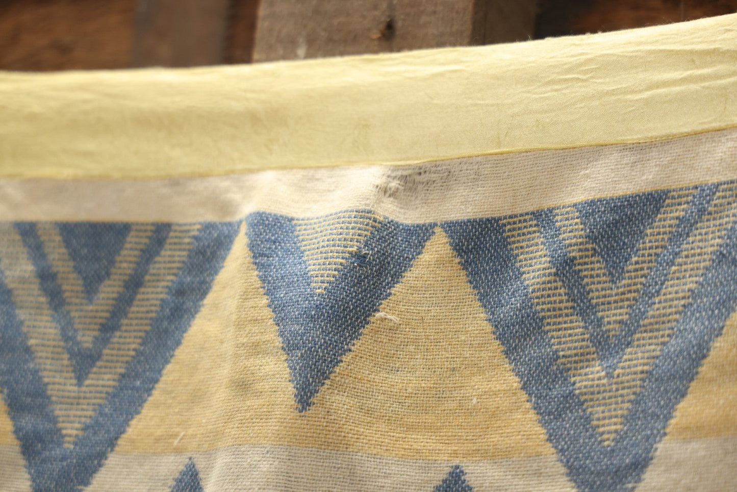 Lot 011 - Vintage Navajo-Style Textile Camp Blanket With Whirling Logs And Thunderbird Motifs, Blue And Yellow, Circa 1920s 60" x 70"