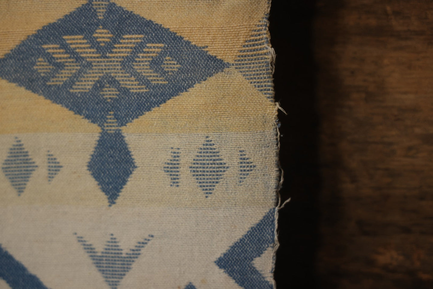 Lot 011 - Vintage Navajo-Style Textile Camp Blanket With Whirling Logs And Thunderbird Motifs, Blue And Yellow, Circa 1920s 60" x 70"