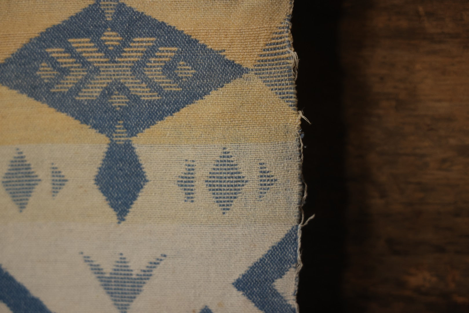 Lot 011 - Vintage Navajo-Style Textile Camp Blanket With Whirling Logs And Thunderbird Motifs, Blue And Yellow, Circa 1920s 60" x 70"