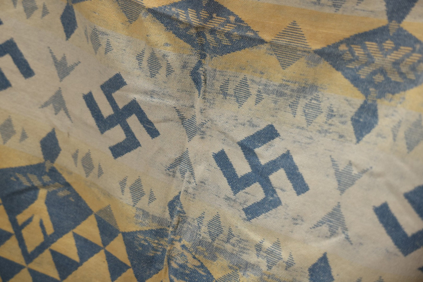 Lot 011 - Vintage Navajo-Style Textile Camp Blanket With Whirling Logs And Thunderbird Motifs, Blue And Yellow, Circa 1920s 60" x 70"