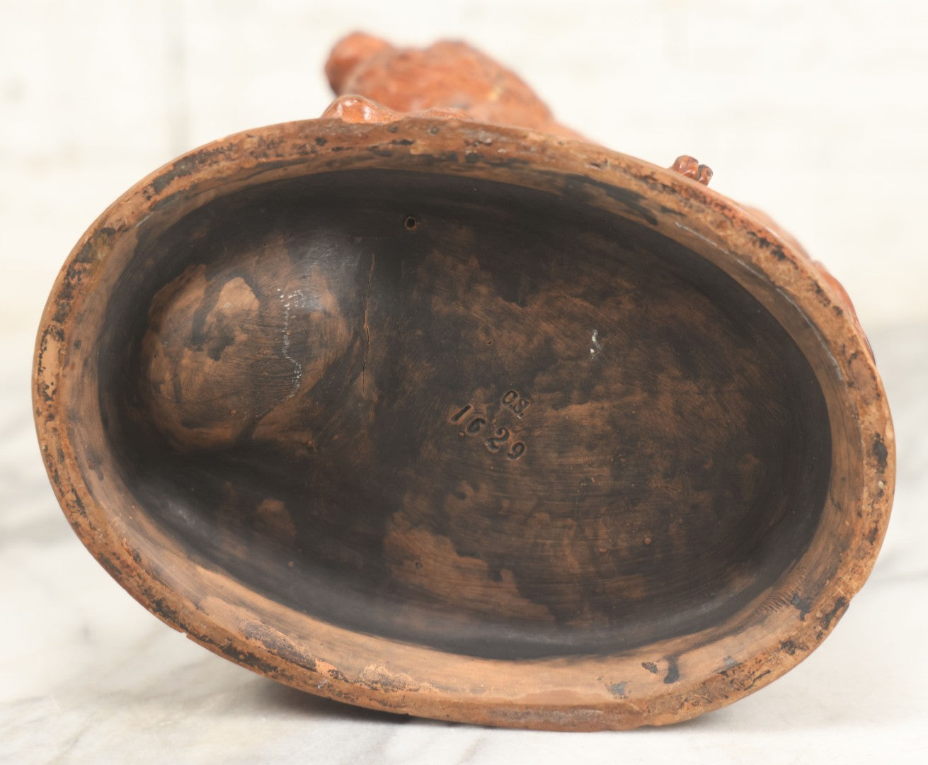 Lot 012 - Antique Red Clay Figural Desk Match Safe Or Holder With Lion And Prey, Marked “O.S.” And Numbered 1629