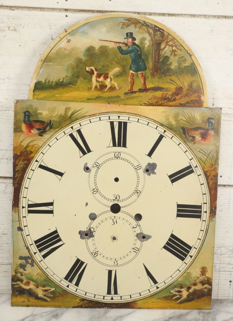 Lot 013 - Antique Hand Painted Metal Clock Face With Hunting Scene, Man With Rifle And Dog, Game Birds, Other Dogs, Unsigned, 14-1/8" x 20-1/4"
