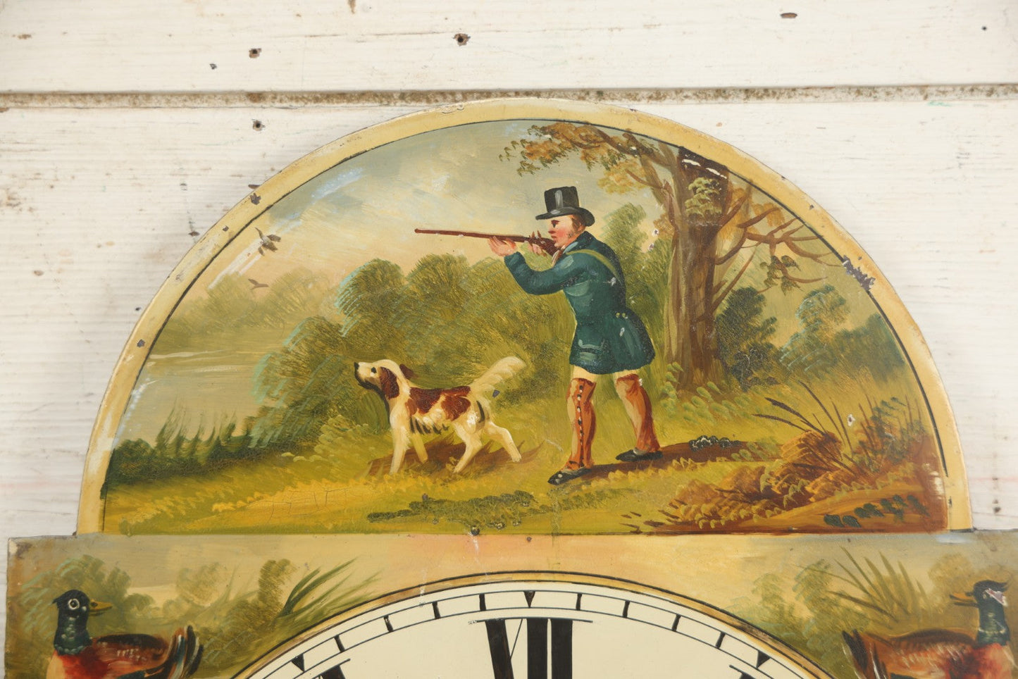 Lot 013 - Antique Hand Painted Metal Clock Face With Hunting Scene, Man With Rifle And Dog, Game Birds, Other Dogs, Unsigned, 14-1/8" x 20-1/4"
