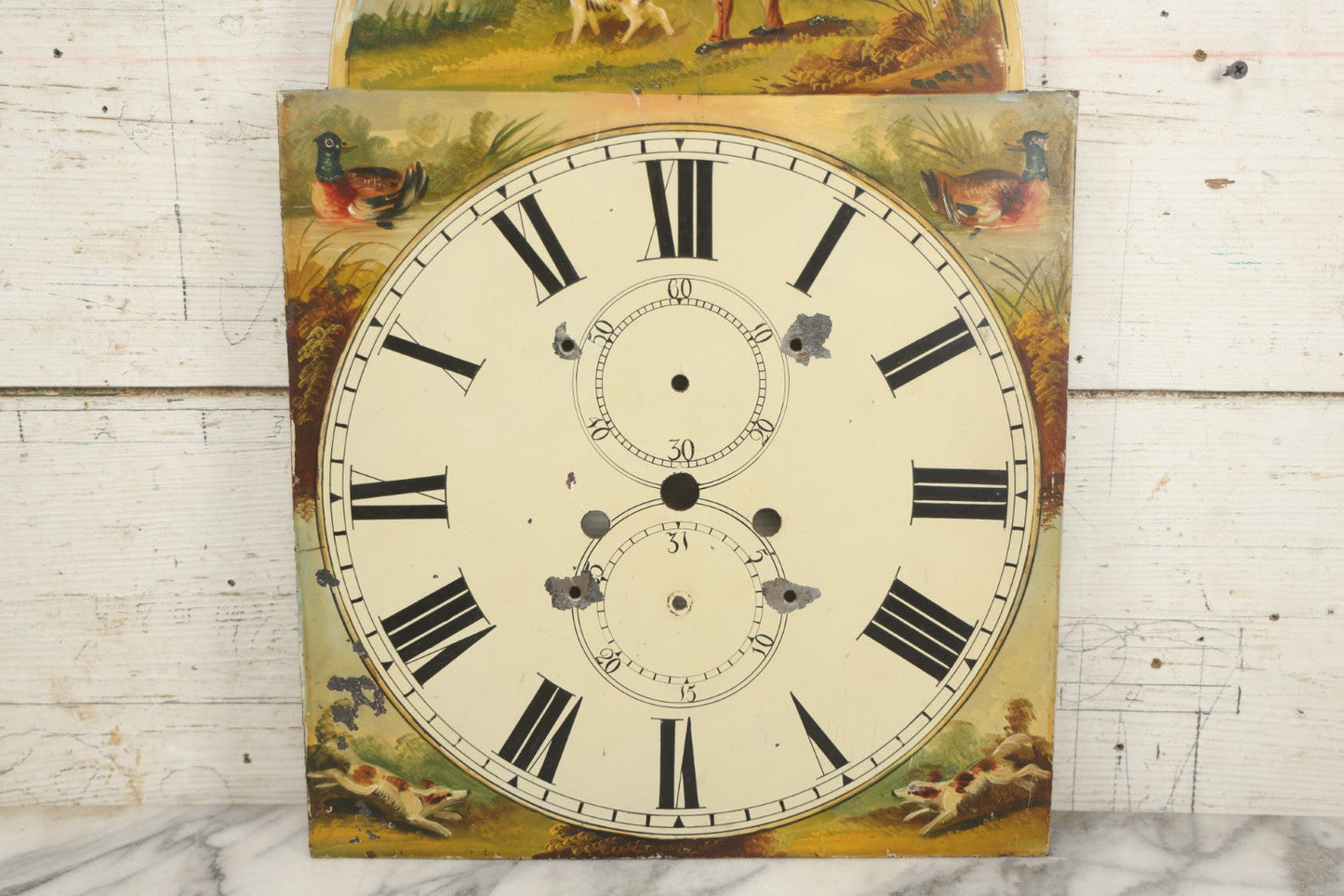 Lot 013 - Antique Hand Painted Metal Clock Face With Hunting Scene, Man With Rifle And Dog, Game Birds, Other Dogs, Unsigned, 14-1/8" x 20-1/4"