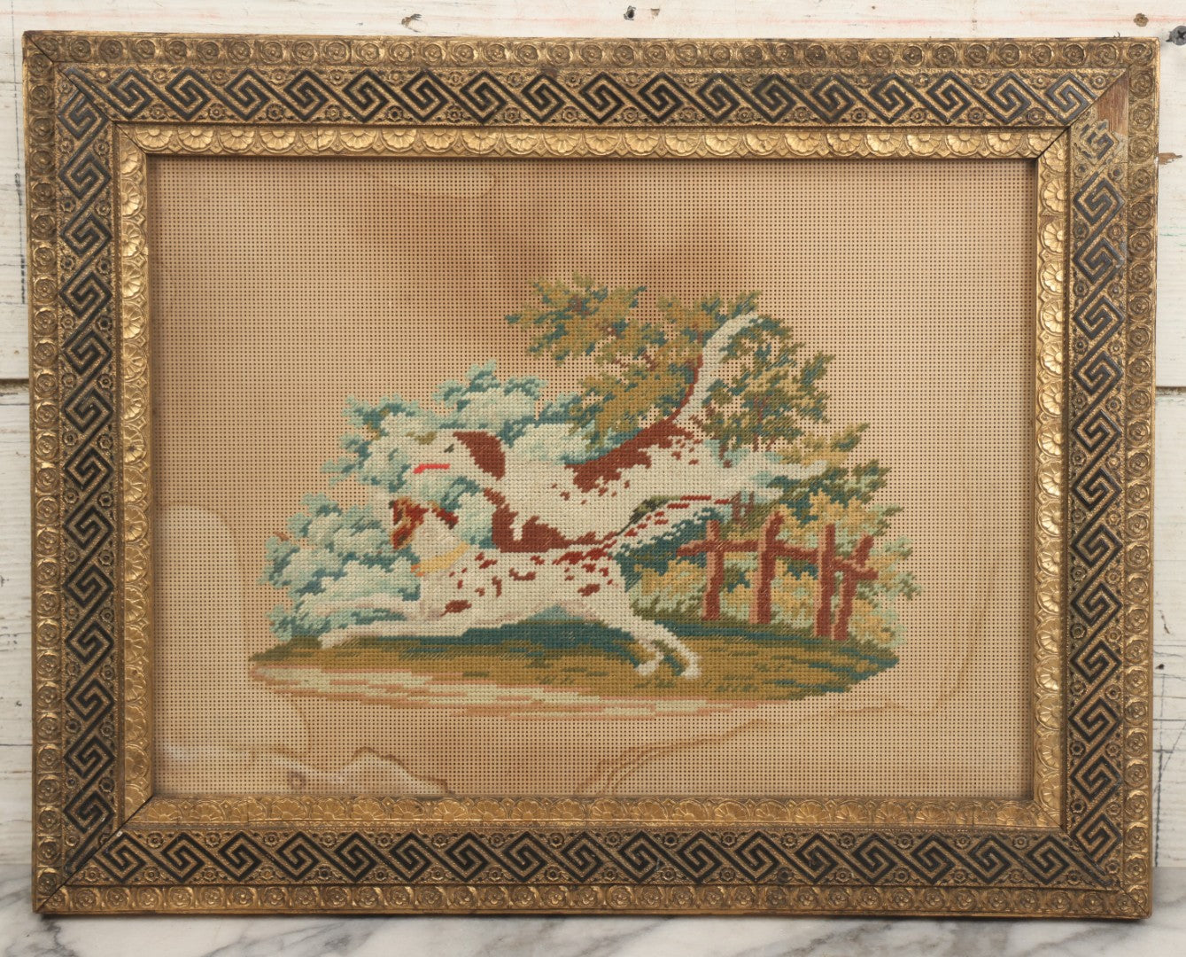 Lot 014 - Antique Punchwork Embroidery Country Scene With Running Dogs In Greek Key Gesso Frame, Note Staining, 18-1/2" x 14-1/2"