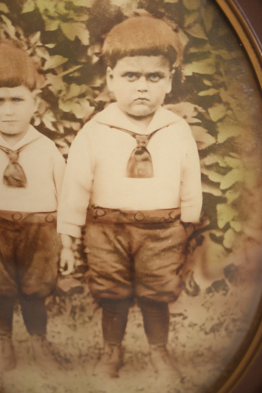 Lot 017 - Antique Sepia Toned Color Tinted Photograph Of Two Brothers In Matching Outfits In Bubble Glass Frame, 14-7/8" x 19-7/8"