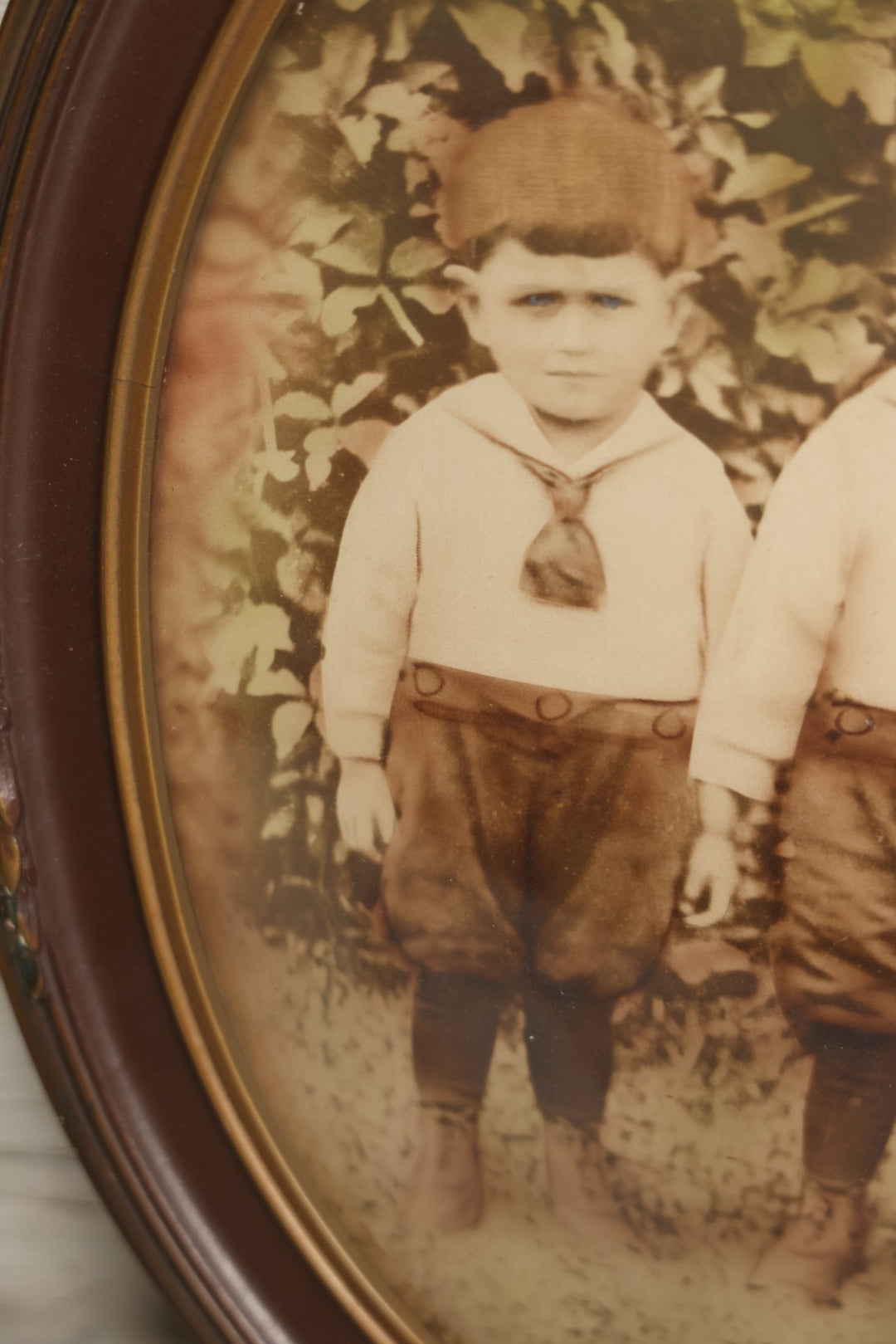 Lot 017 - Antique Sepia Toned Color Tinted Photograph Of Two Brothers In Matching Outfits In Bubble Glass Frame, 14-7/8" x 19-7/8"