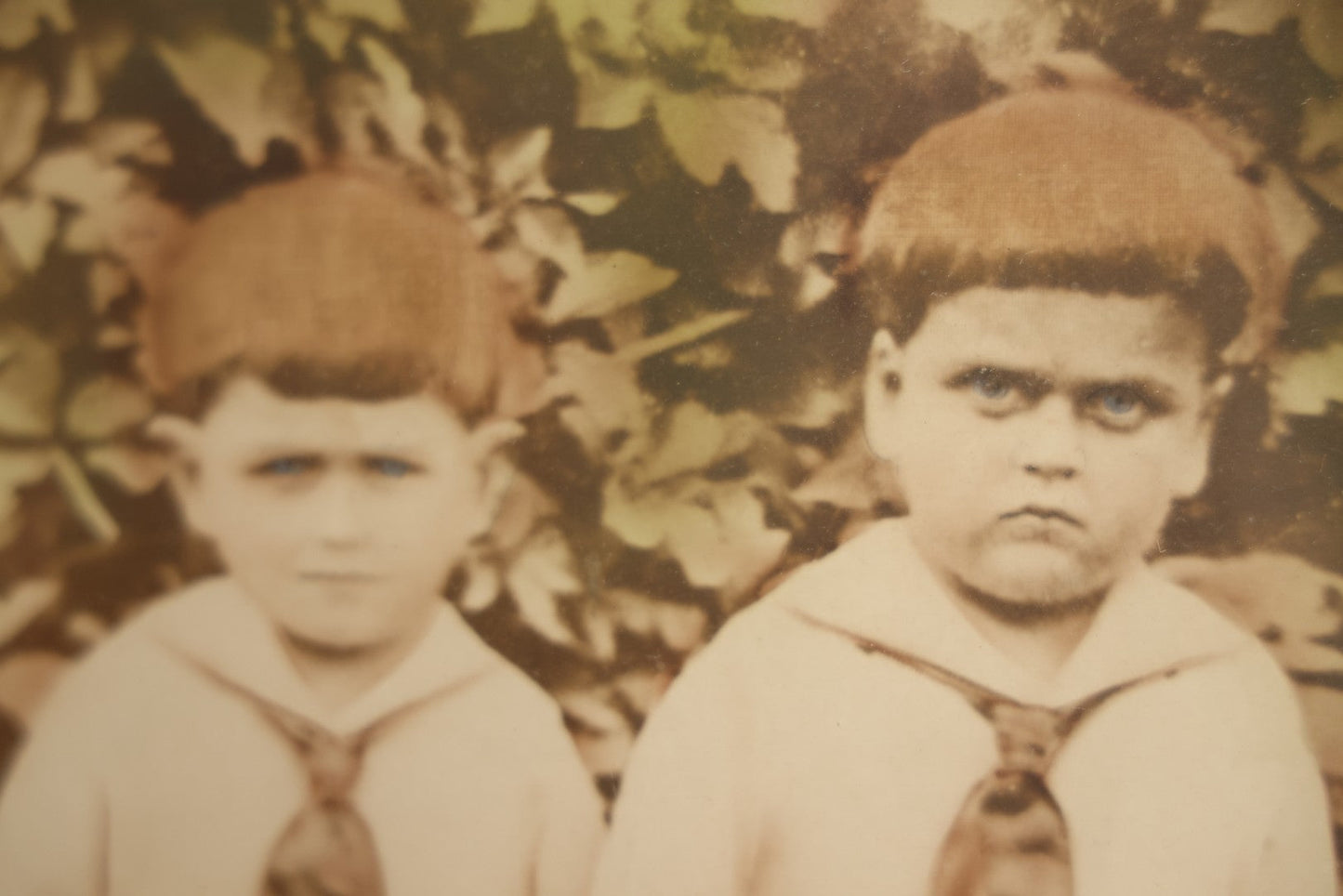 Lot 017 - Antique Sepia Toned Color Tinted Photograph Of Two Brothers In Matching Outfits In Bubble Glass Frame, 14-7/8" x 19-7/8"