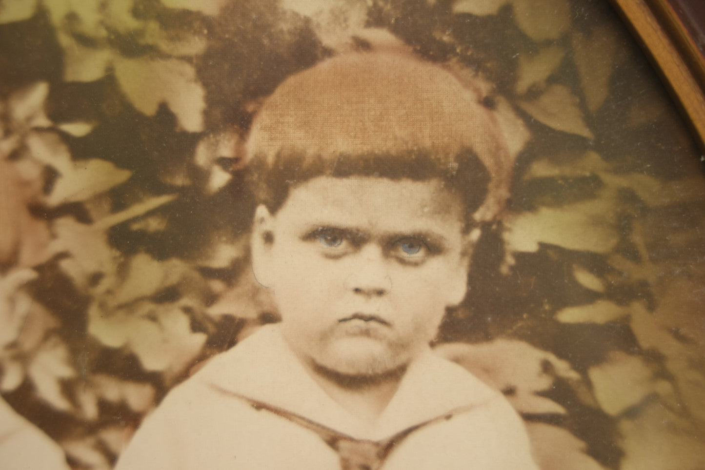 Lot 017 - Antique Sepia Toned Color Tinted Photograph Of Two Brothers In Matching Outfits In Bubble Glass Frame, 14-7/8" x 19-7/8"