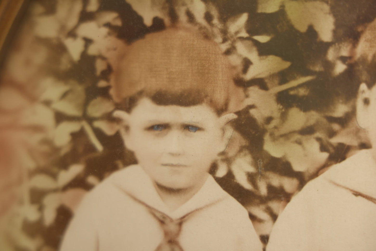 Lot 017 - Antique Sepia Toned Color Tinted Photograph Of Two Brothers In Matching Outfits In Bubble Glass Frame, 14-7/8" x 19-7/8"