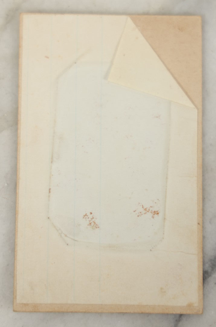 Lot 019 - Antique Not-So-Hidden Mother Tintype Photograph Of A Blonde Toddler In Striped Dress With Mother's Hand, Chin Visible, In Paper Frame