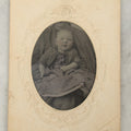 Lot 020 - Antique Not-So-Hidden Mother Tintype Photograph Of A Chubby Cheeked Baby With Mother's Chin Visible, In Paper Frame