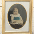 Lot 021 - Antique Full Plate Tintype Photograph Of A Chubby Baby With Ruffled Collar, Hand Tinted With Blue And White Coloring, In Frame, 9-1/2" x 11-1/2"