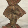 Lot 022 - Antique Cast Iron Sunbonnet Sue Doorstop With Remnants Of Original Paint, 6-1/2" H