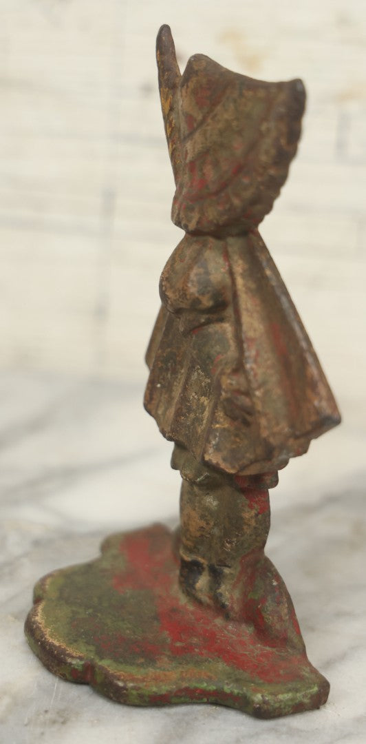 Lot 022 - Antique Cast Iron Sunbonnet Sue Doorstop With Remnants Of Original Paint, 6-1/2" H