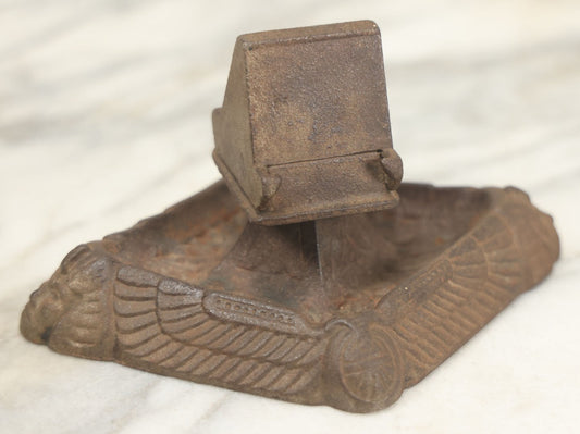 Lot 024 - Antique Cast Iron Egyptian Revival Match Book Holder Ashtray With Winged Scarab, Pharaoh Face Motifs, Marked With Illegible Patent Date, Circa 1920, Note Rust On Bottom