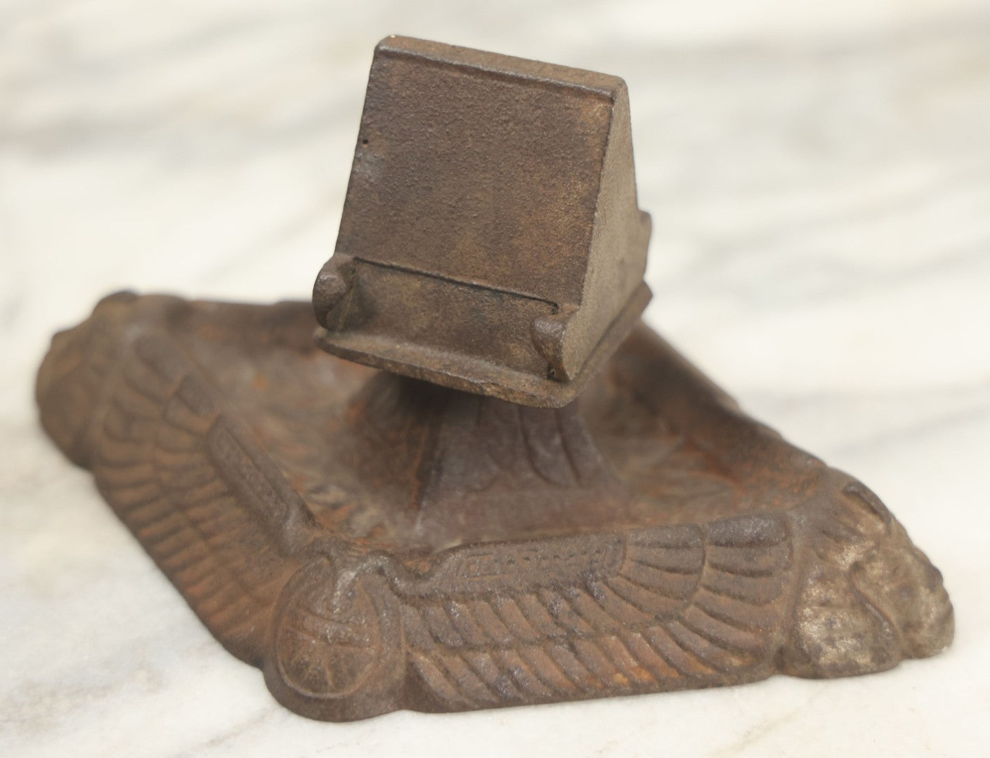 Lot 024 - Antique Cast Iron Egyptian Revival Match Book Holder Ashtray With Winged Scarab, Pharaoh Face Motifs, Marked With Illegible Patent Date, Circa 1920, Note Rust On Bottom