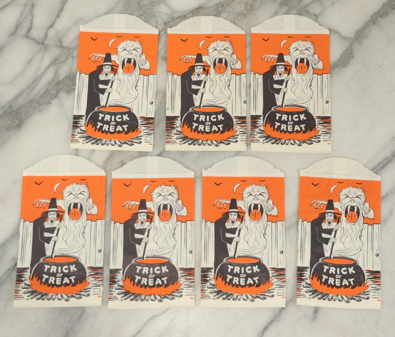 Lot 035 - Grouping Of Seven N.O.S. New Old Stock Vintage Halloween Trick-Or-Treat Bags With Witch And Cauldron Design