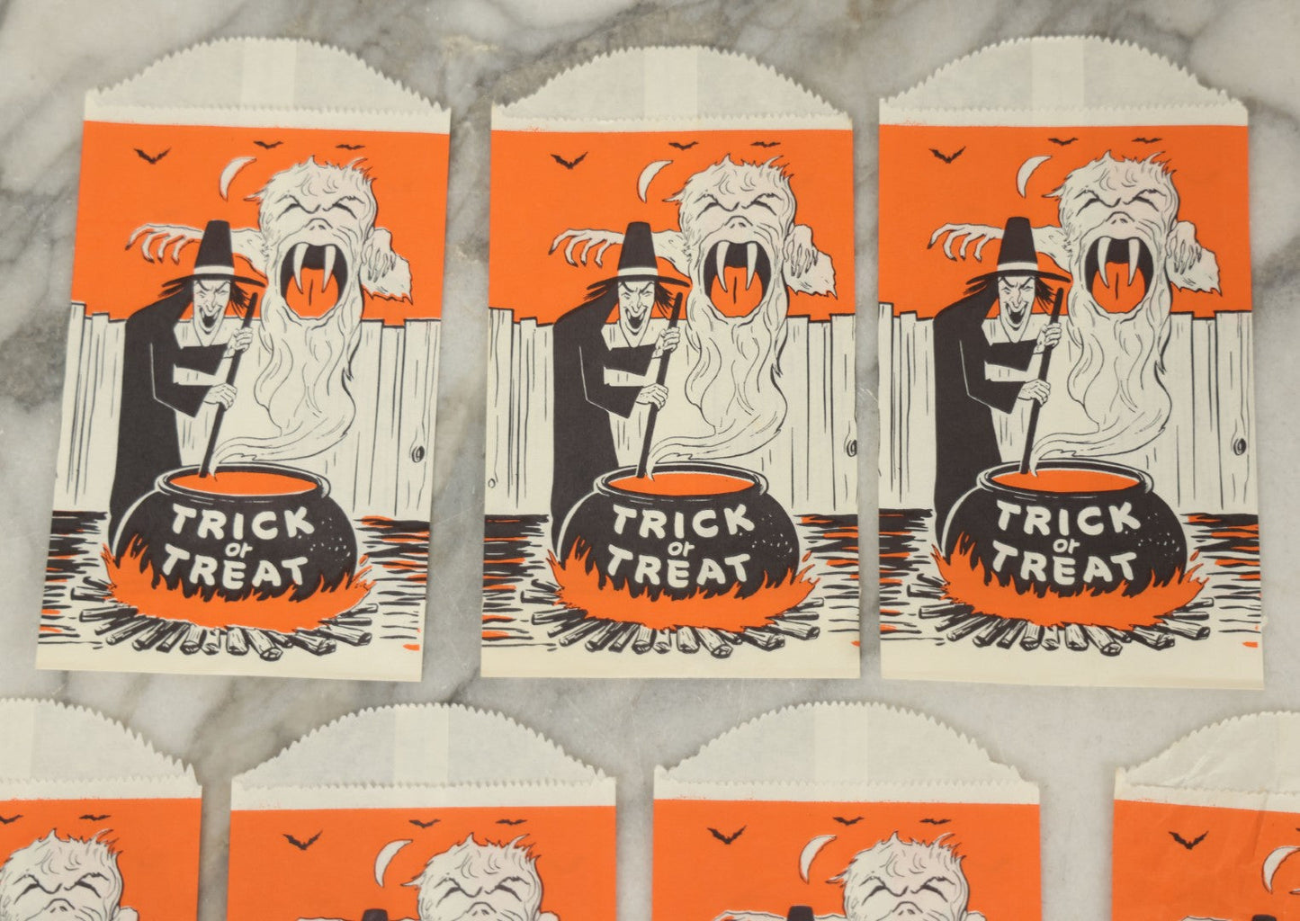 Lot 035 - Grouping Of Seven N.O.S. New Old Stock Vintage Halloween Trick-Or-Treat Bags With Witch And Cauldron Design
