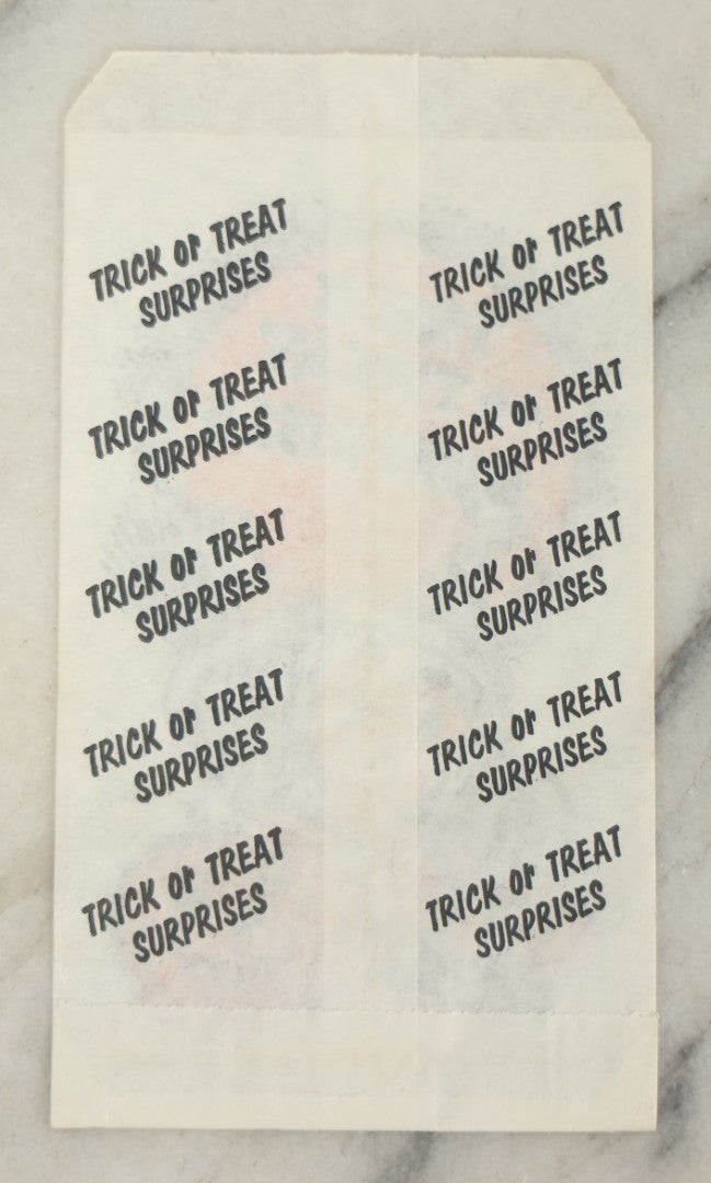 Lot 037 - Grouping Of Three N.O.S. New Old Stock Vintage Halloween Trick-Or-Treat Bags With Clown, Jack O'Lantern, And Costume Characters, “Trick Or Treat Surprises,” Unique Industries Inc., Philadelphia