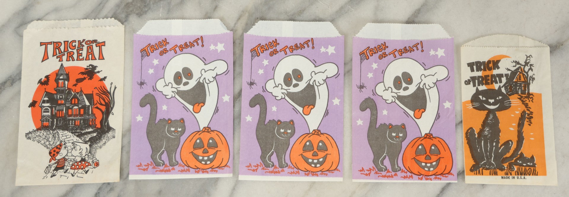 Lot 039 - Grouping Of Five N.O.S. New Old Stock Vintage Halloween Trick-Or-Treat Bags With Haunted House, Ghost With Jack O'Lantern, And Black Cat Designs
