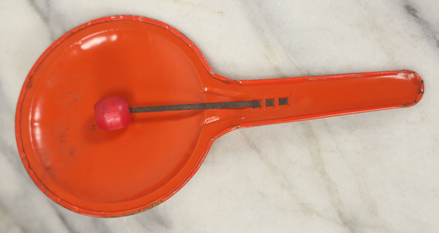 Lot 041 - Vintage Tin Lithograph Halloween Noisemaker With Snaggle-Toothed Witch On Orange Background, Made In U.S.A., 8-1/4" L