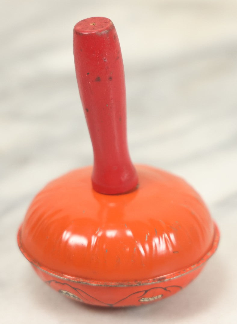 Lot 042 - Vintage Round Tin Lithograph Halloween Rattle Noisemaker With Jack-O'-Lantern Pumpkins Design