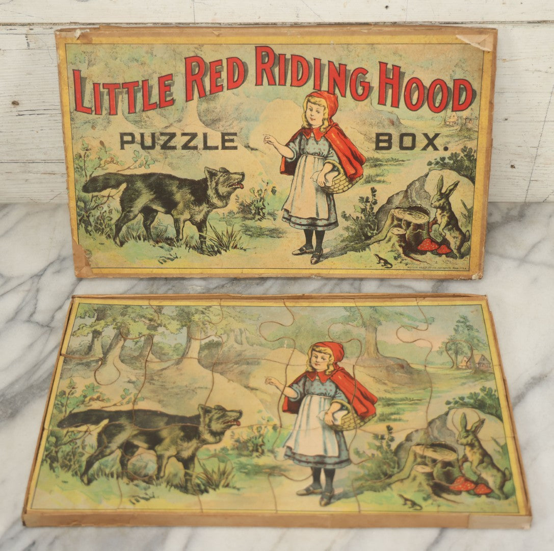 Lot 045 - Antique Little Red Riding Hood Puzzle Box With Three Lithographed Puzzles, Milton Bradley Co., Springfield Massachusetts, Circa 1895, Complete