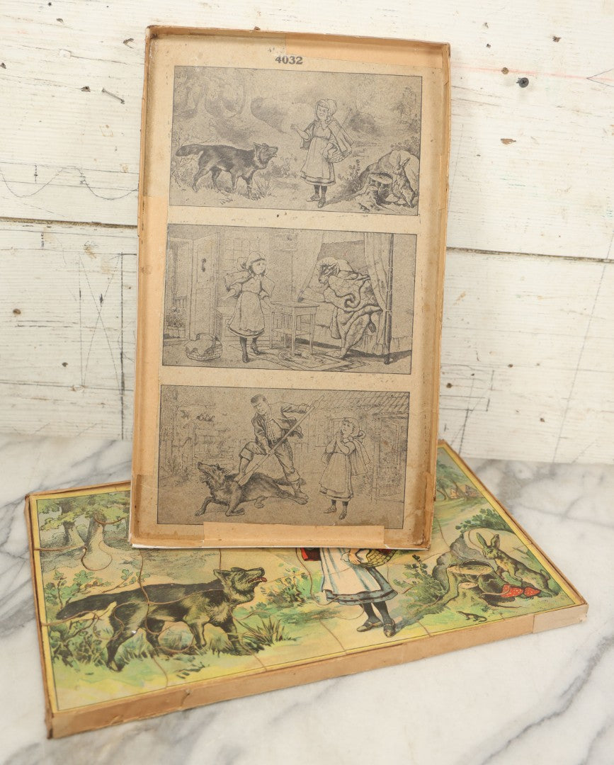 Lot 045 - Antique Little Red Riding Hood Puzzle Box With Three Lithographed Puzzles, Milton Bradley Co., Springfield Massachusetts, Circa 1895, Complete