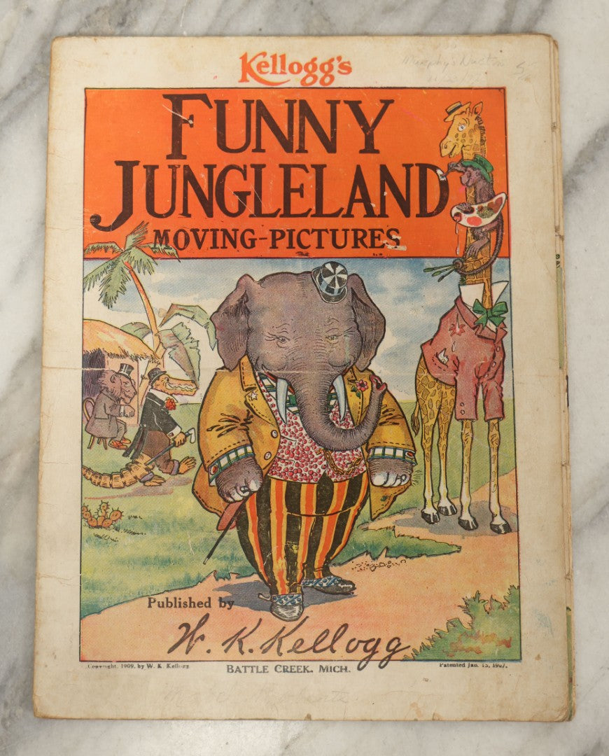 Lot 047 - Antique Kellogg's Cereal Advertising Book, "Funny Jungleland Moving Pictures" With Anthropomorphic Animals, Pages Flip To MIX And Match Heads, Outfits, Bodies, Copyright 1909 By W.K. Kellogg, Battle Creek, Michigan 