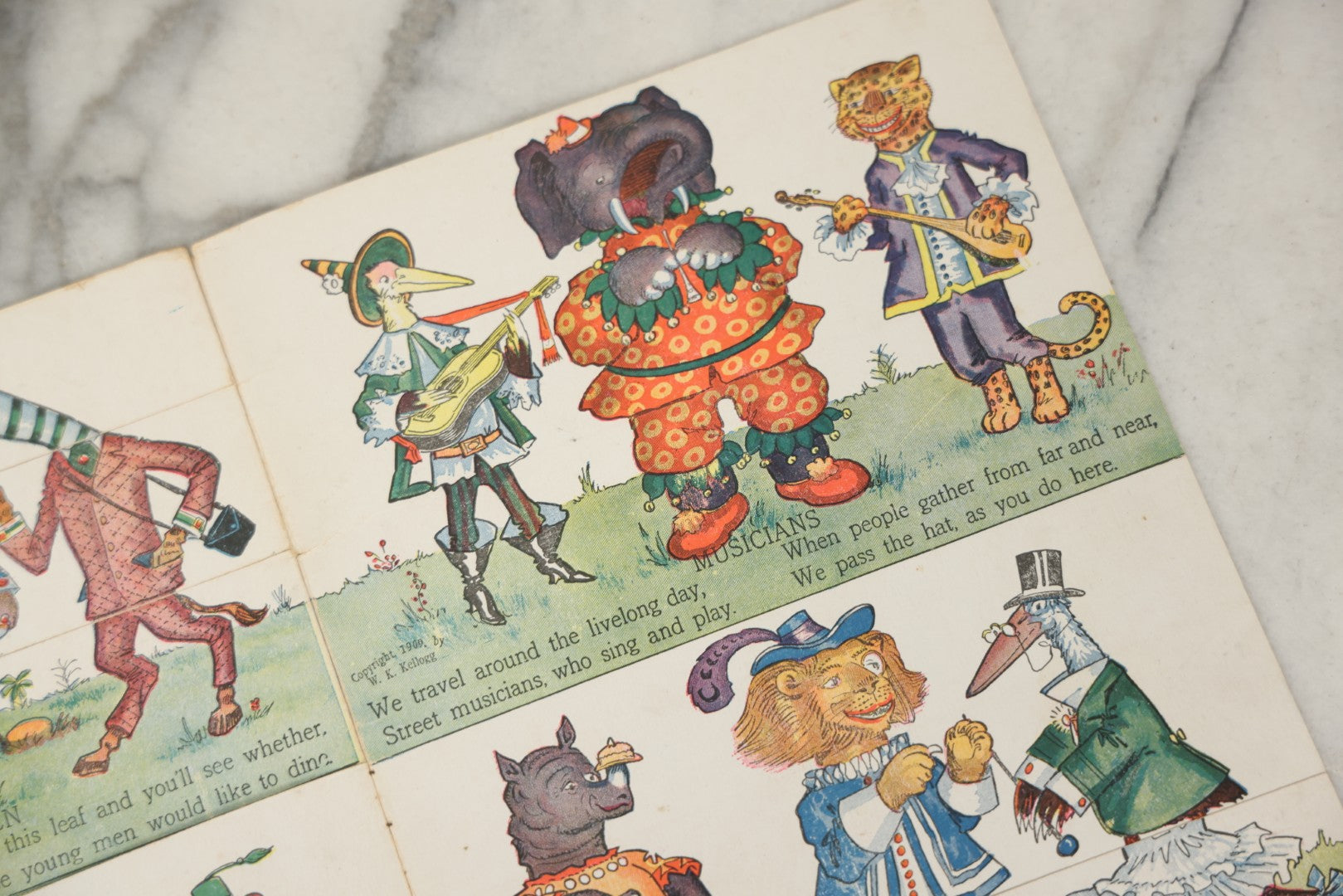 Lot 047 - Antique Kellogg's Cereal Advertising Book, "Funny Jungleland Moving Pictures" With Anthropomorphic Animals, Pages Flip To MIX And Match Heads, Outfits, Bodies, Copyright 1909 By W.K. Kellogg, Battle Creek, Michigan 