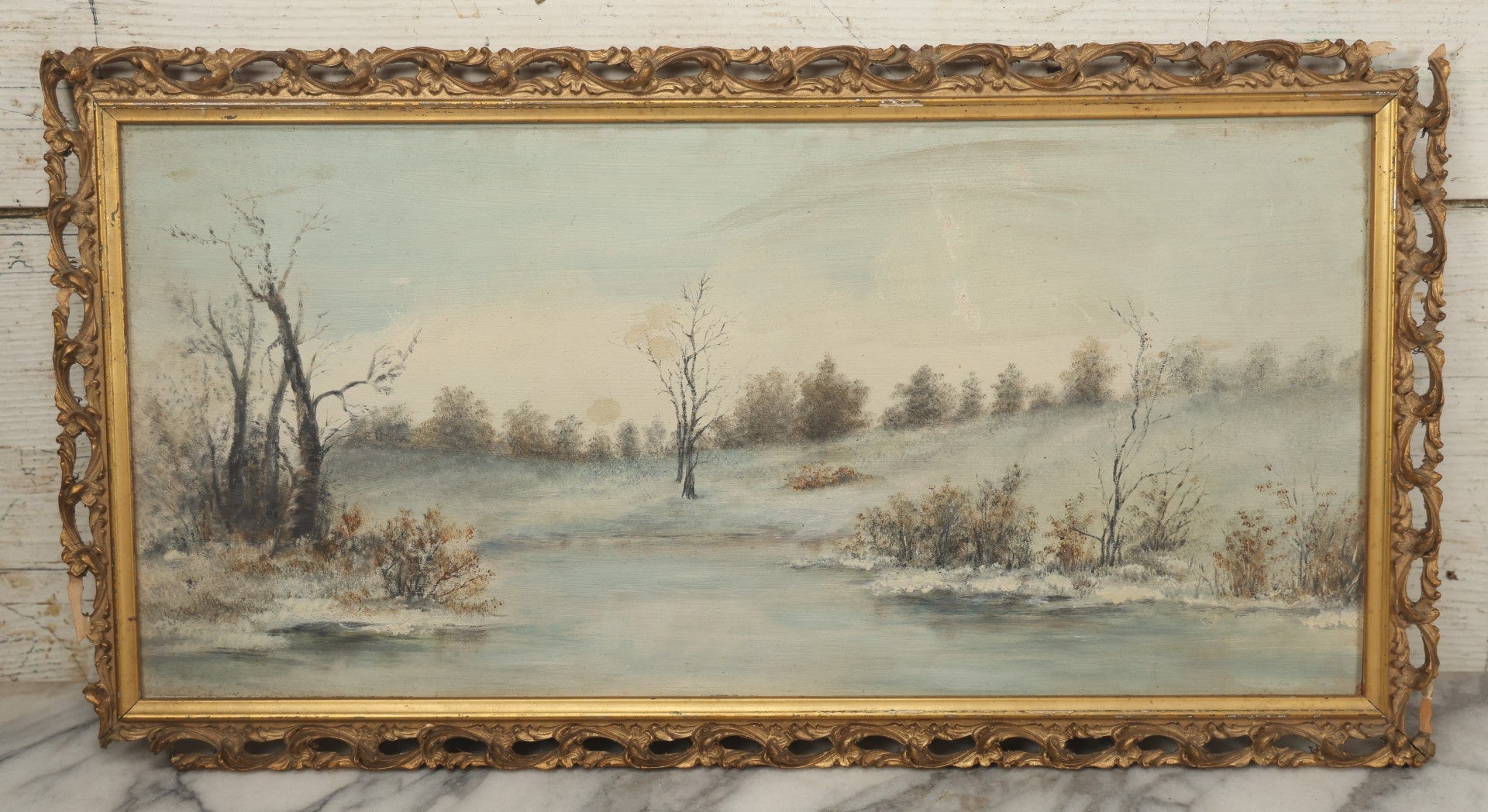 Lot 054 - Antique Oil On Board Landscape Painting Depicting Winter Scene With Trees And River Scene In Gilt Frame, 22-1/8" x 11-5/8"
