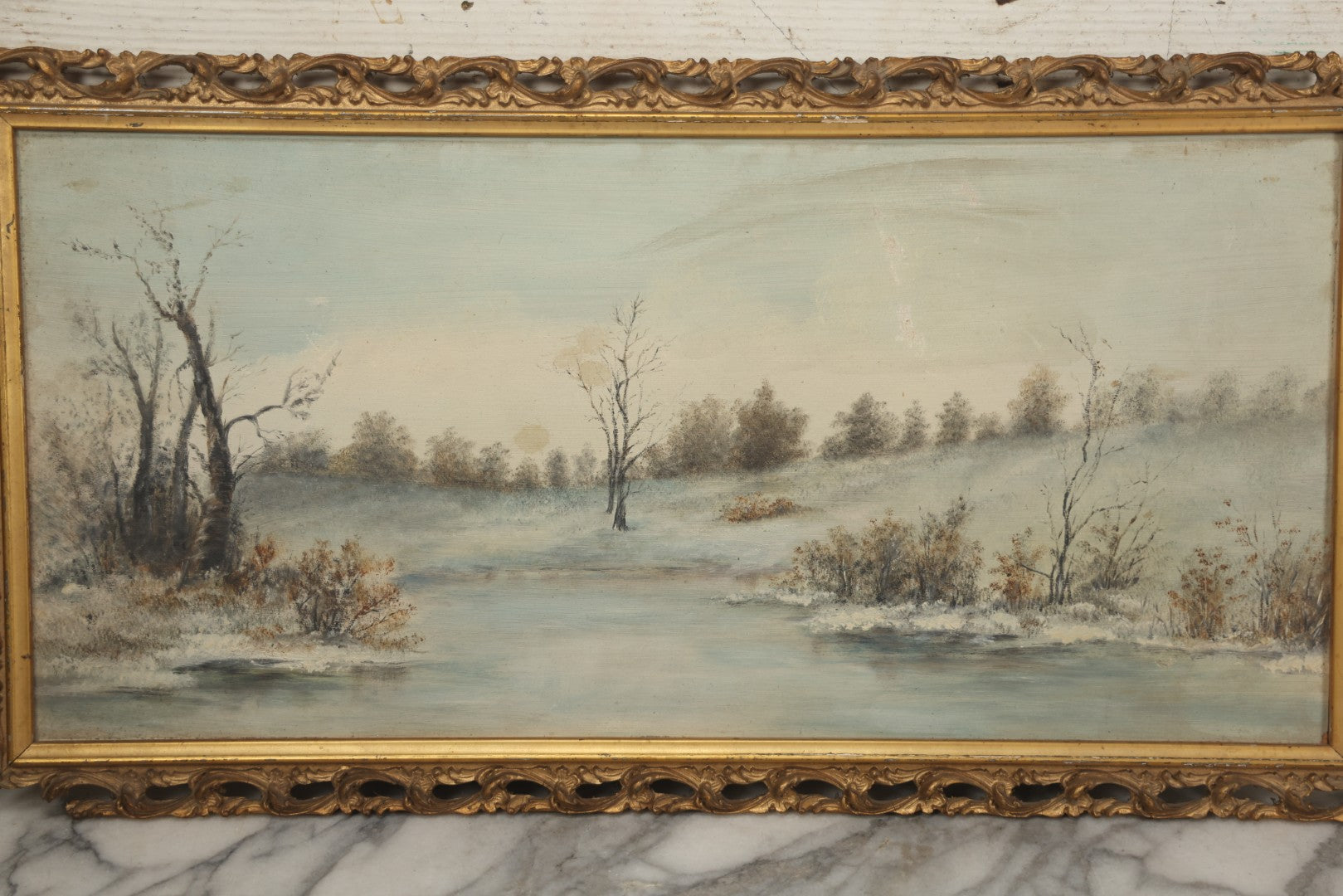 Lot 054 - Antique Oil On Board Landscape Painting Depicting Winter Scene With Trees And River Scene In Gilt Frame, 22-1/8" x 11-5/8"