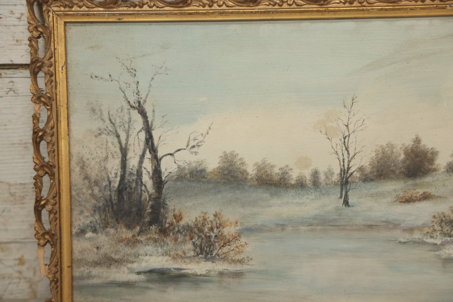 Lot 054 - Antique Oil On Board Landscape Painting Depicting Winter Scene With Trees And River Scene In Gilt Frame, 22-1/8" x 11-5/8"